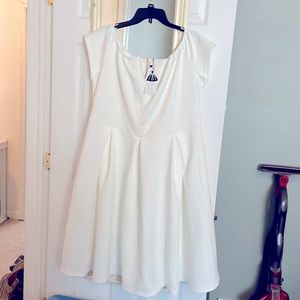 White knee length dress. NWT